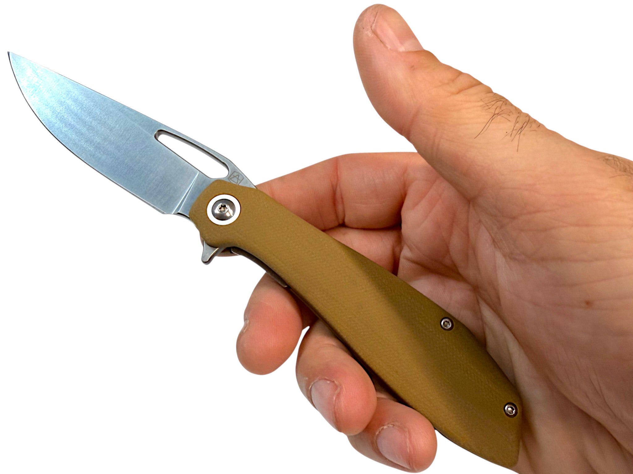 CountyComm Exclusive BXTR folding knife with a tan G10 handle and semi-polished steel blade held in a hand.