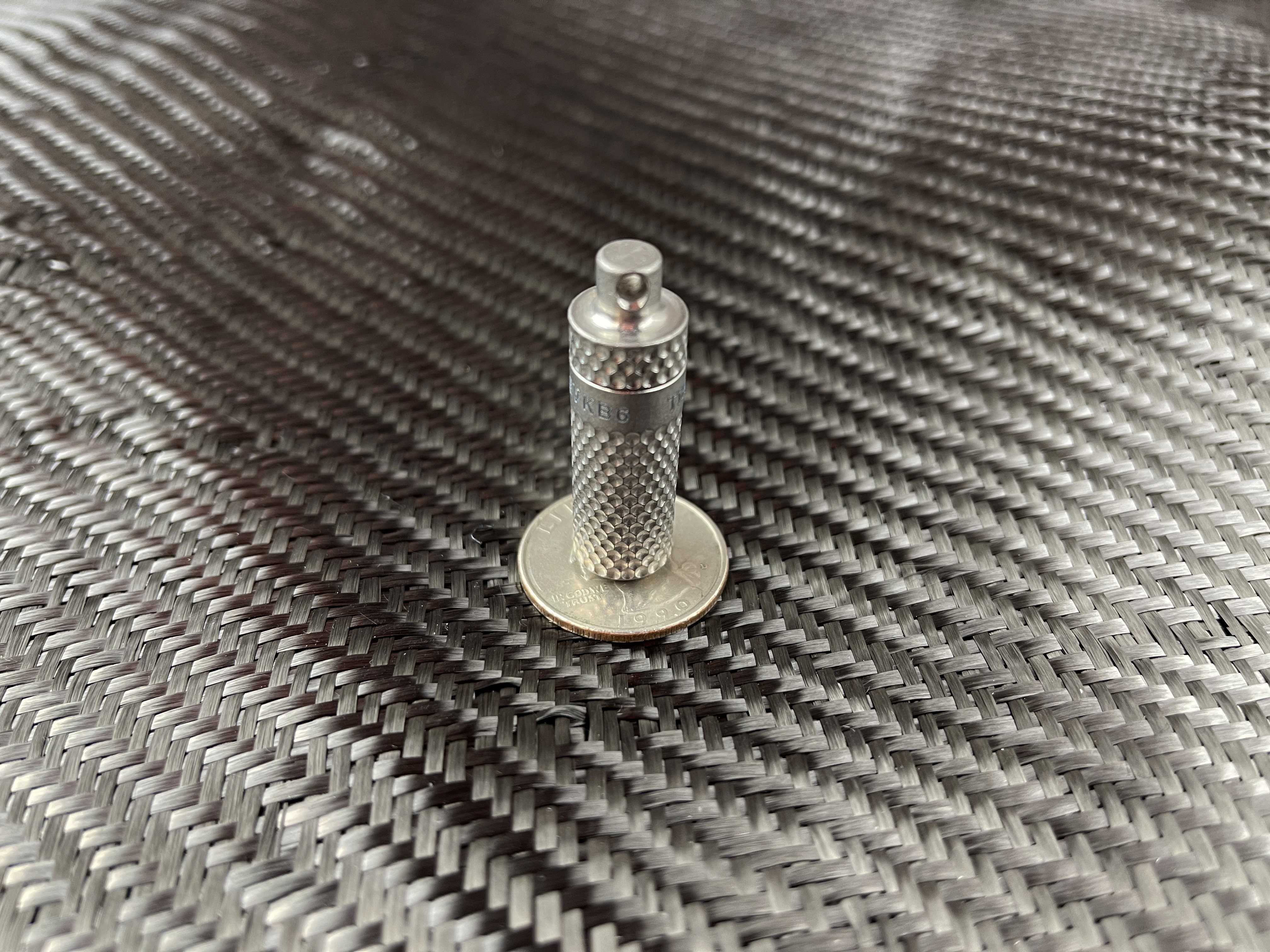 Piccolo Titanium Dimpled Capsule - CountyComm
